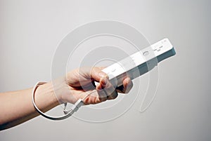 Hand holding game controller