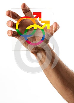 Hand holding glass with gay marriage symbols