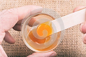 Glass of orange jelly made of Psyllium mucilage photo