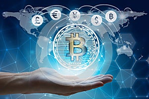 hand holding global network using Currencies sign symbol interface of Bitcoin Fintech, virtual currency blockchain technology con