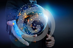 Hand holding Global world telecommunication network connected around planet