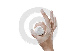 Hand holding golf ball