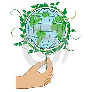 Hand holding the Green Planet Earth