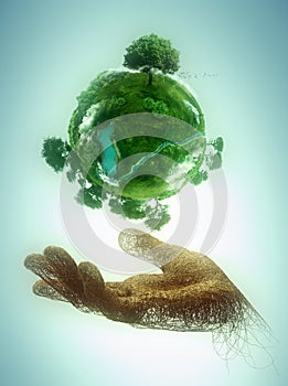 Hand holding a green planet