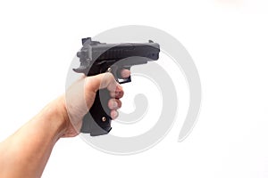 Hand holding a gun photo