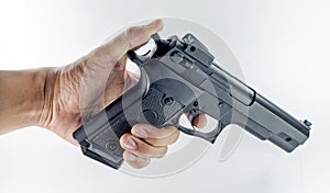 Hand holding a handgun