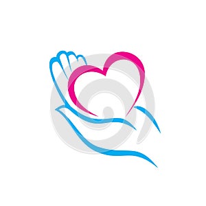 Hand holding a heart icon