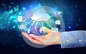 Hand holding hovering cloud computing concept