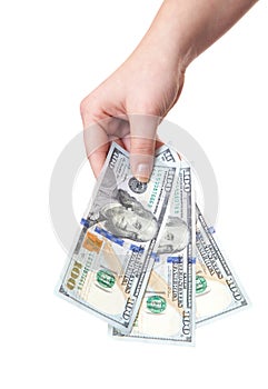 Hand holding hundred dollar notes