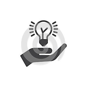 Hand holding idea bulb icon vector, filled flat sign, solid pictogram isolated on white. Idea sharing symbol, logo illustration.