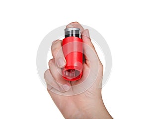 Hand holding inhaler facing viewer, isolated