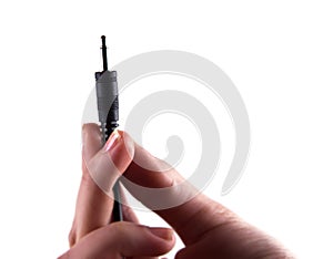 Hand holding instrument cable