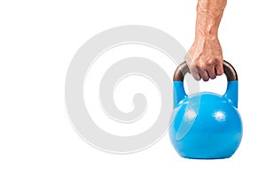 A hand holding Kettlebell