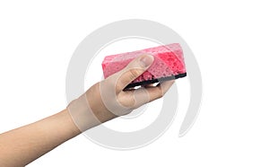 Hand holding kitchen cleaning sponge without rubber glove, isolated on a white background photo