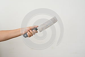 Hand holding a knife