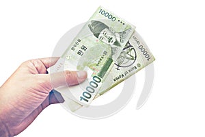 Hand holding Korean won money 