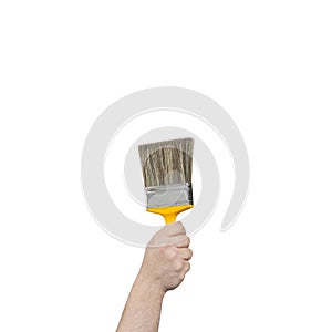 Hand Holding a Large Paintbrush with Clipping Path