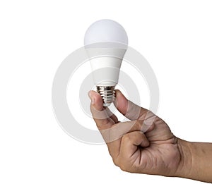 Hand holding led light bulb