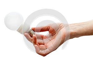 Hand holding led lightbulb