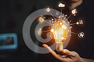 hand holding light bulb business digital marketing innovation technology icons network