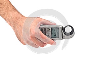 Hand holding a light meter