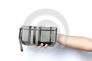 hand holding Luxury Women\'s Bag isolated on a white background