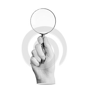 Hand holding magnifier, loupe, magnifying lens glass isolated on white background