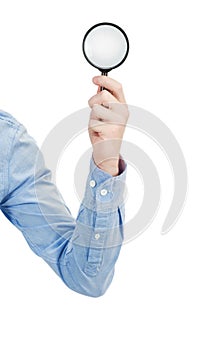 hand holding magnifying glass