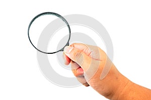 Hand holding magnifying glass