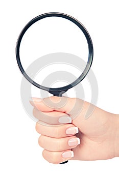 Hand holding magnifying glass