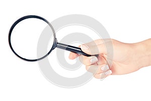 Hand holding magnifying glass