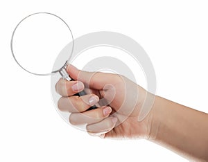 Hand holding magnifying glass