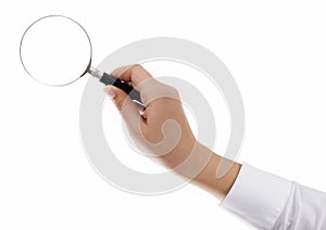 Hand holding magnifying glass