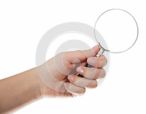 Hand holding magnifying glass