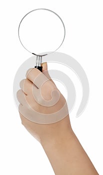 Hand holding magnifying glass