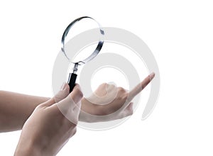 Hand holding magnifying glass isolated on white background