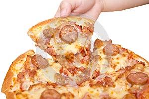 Hand holding Meat deluxe pizza, itlian food