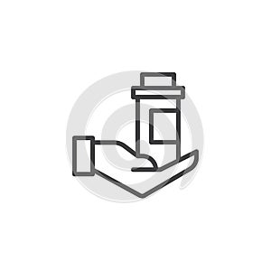 Hand holding medicine bottle outline icon