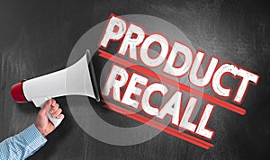 Hand holding megaphone against blackboard with text PRODUCT RECALL