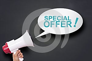 Hand Holding Megaphone with Big Sale Special Offer