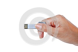 Hand holding Metal Key USB data storage isolated on white background