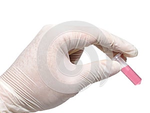 Hand holding microcentrifuge tube