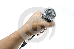 Hand is holding microphone