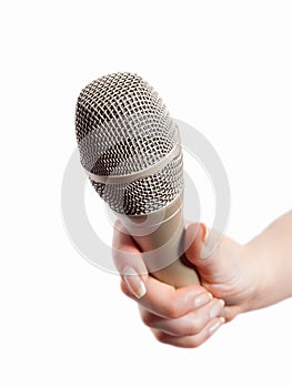 Hand holding microphone