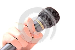 Hand holding microphone