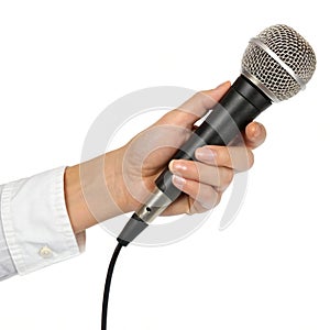 Hand with a microphone isolated on white background