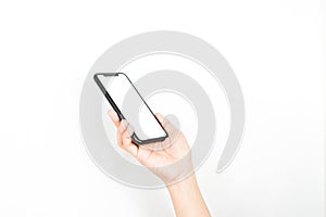 Hand holding a mobile phone with a blank white screen for mockup