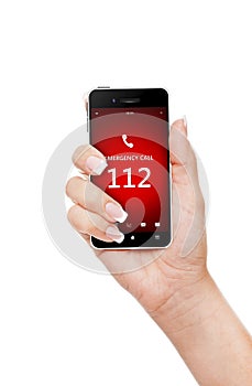 Hand holding mobile phone with emergency number 112