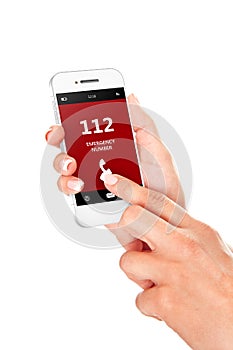 hand holding mobile phone with emergency number 112 isolated over white