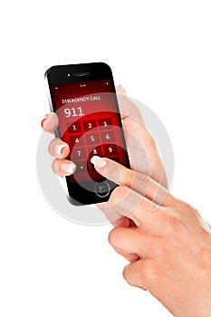 Hand holding mobile phone with emergency number 911